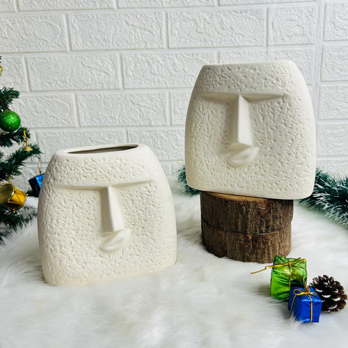 White Sculpted Face Ceramic Vase